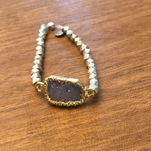 Good Charma silver bead Bracelet with purple stone.